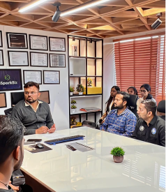 Business team discussing infrastructure strategies at eS office.