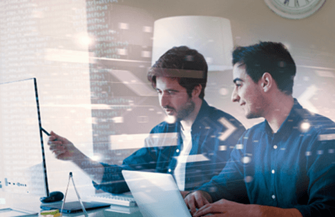 Two developers collaborating on software development at eS company.
